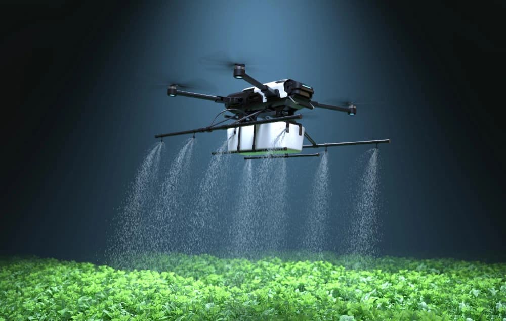 An agricultural drone applying precision technology over a growing crop